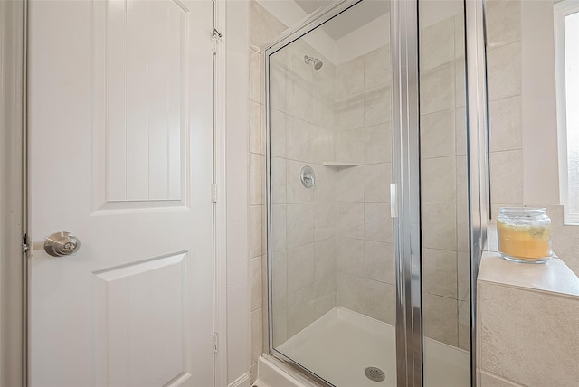 bathroom featuring a stall shower