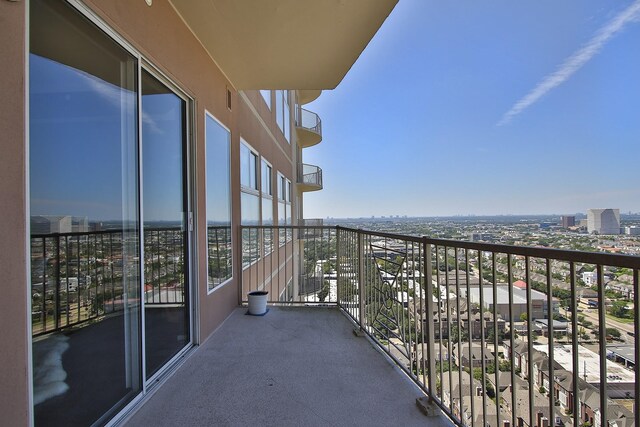 balcony featuring a view of city