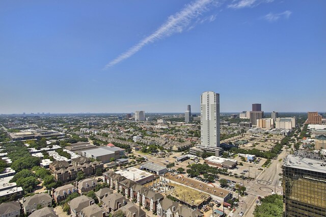 drone / aerial view featuring a city view