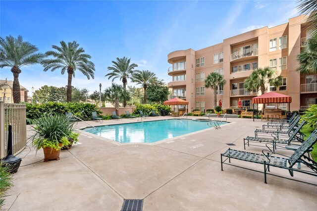 pool with a patio