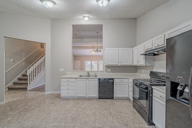 kitchen with light countertops, under cabinet range hood, black appliances, and light tile patterned floors