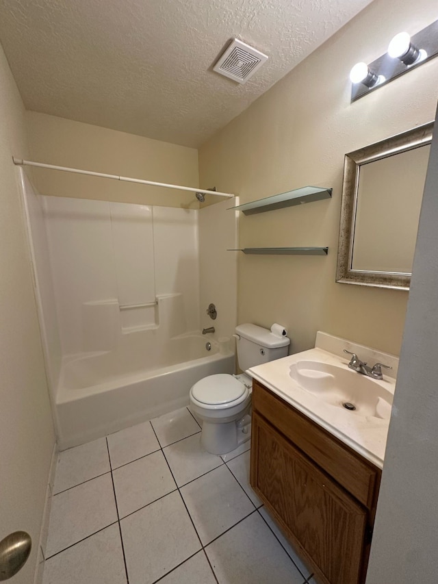 full bath with visible vents, tile patterned flooring, vanity, toilet, and a textured ceiling