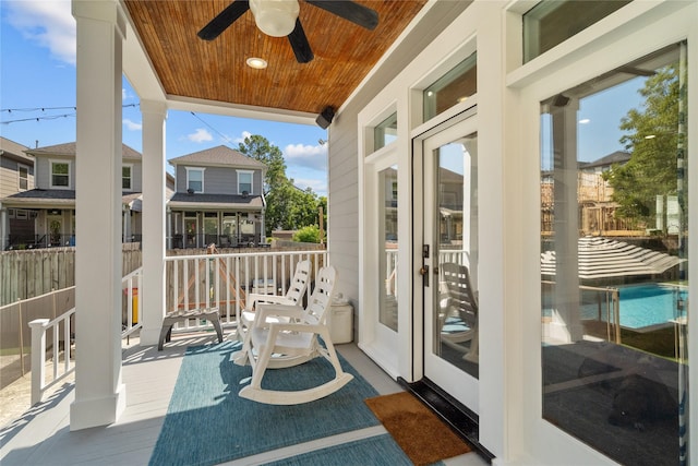 balcony featuring ceiling fan