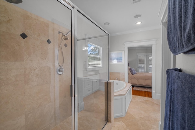 ensuite bathroom featuring visible vents, a garden tub, a shower stall, and ensuite bath