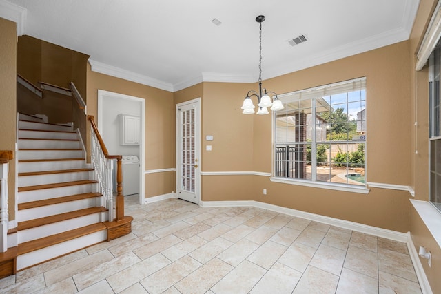 foyer entrance featuring stairway, visible vents, washer / clothes dryer, and ornamental molding