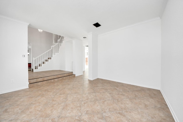 tiled spare room with stairs, ornamental molding, and baseboards