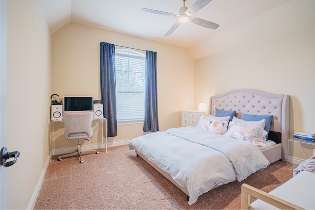 bedroom with carpet floors, lofted ceiling, ceiling fan, and baseboards