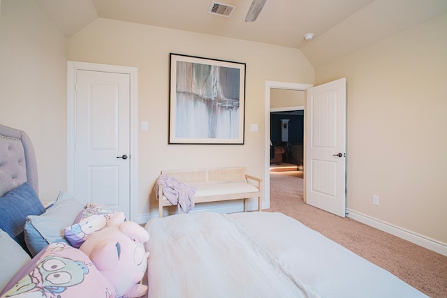 bedroom featuring lofted ceiling, carpet floors, visible vents, and baseboards