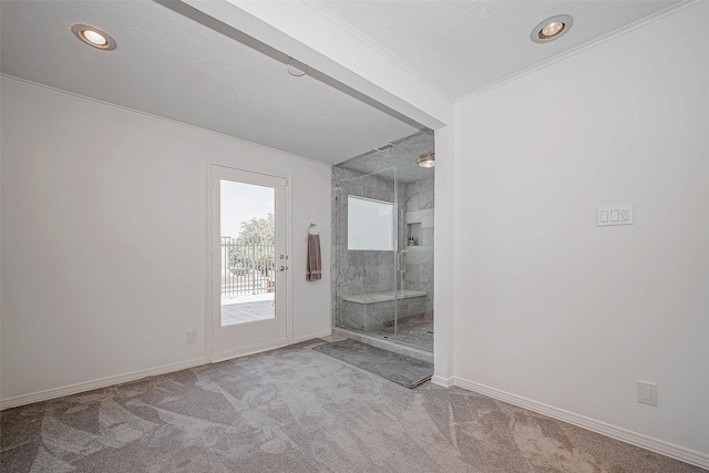 bathroom featuring recessed lighting, crown molding, a shower stall, and baseboards