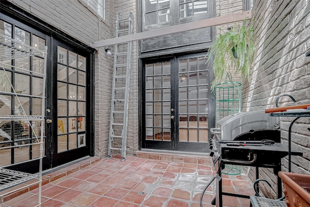 doorway to property featuring french doors