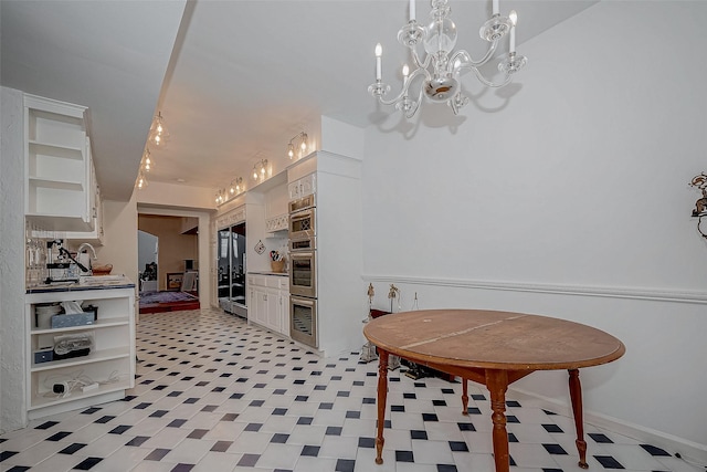 dining room featuring a chandelier