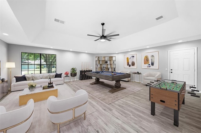 playroom featuring visible vents, a tray ceiling, and pool table