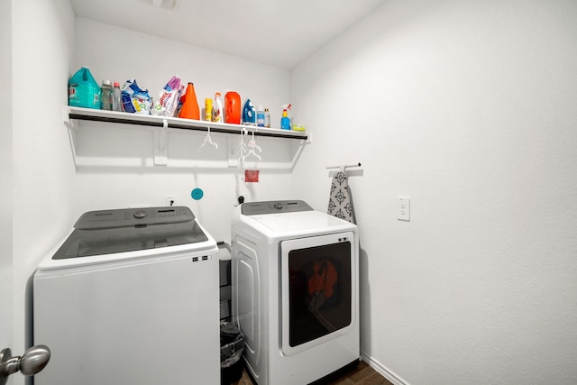 washroom with laundry area and washing machine and dryer