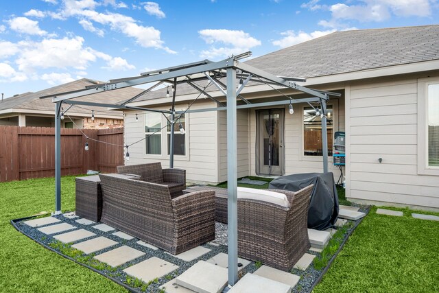 view of patio / terrace with a grill, fence, and an outdoor hangout area