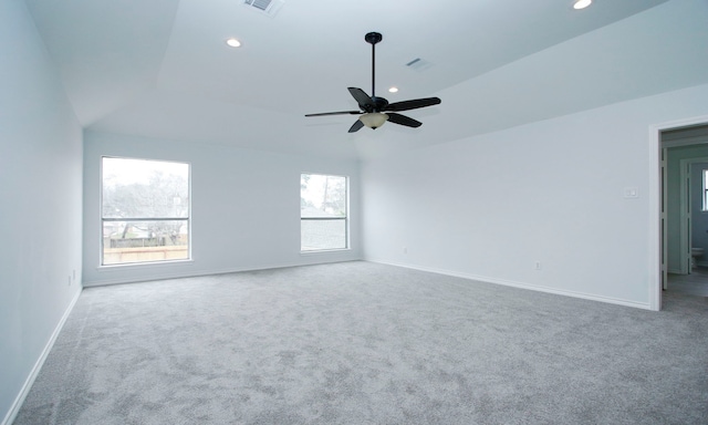 unfurnished room with recessed lighting, carpet, visible vents, and baseboards