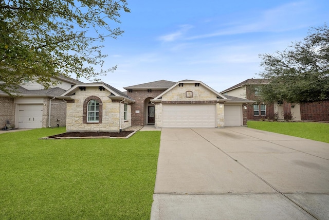 view of front facade featuring a front lawn, concrete driveway, stone siding, and an attached garage