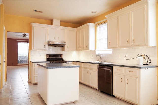 kitchen with black dishwasher, dark countertops, a kitchen island, stainless steel electric range, and under cabinet range hood