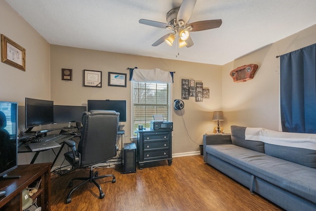 home office with ceiling fan, wood finished floors, and baseboards