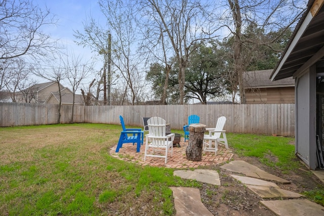 view of yard with a patio area and a fenced backyard