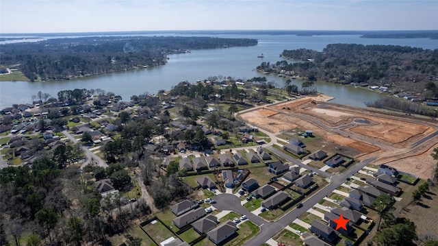 bird's eye view with a water view and a residential view