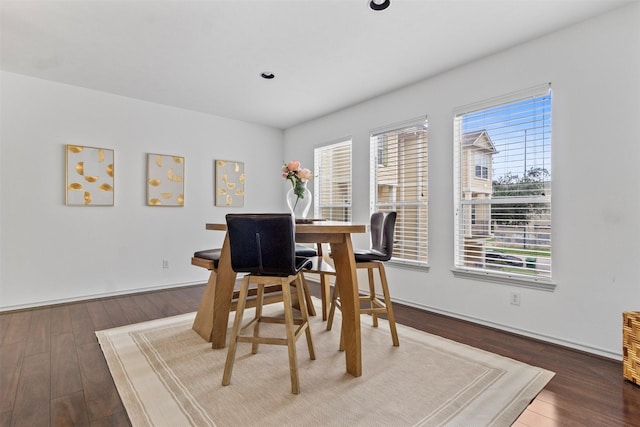 dining room with recessed lighting and hardwood / wood-style flooring