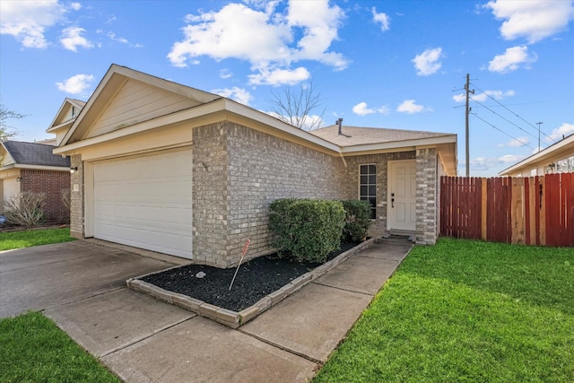 single story home featuring an attached garage, brick siding, fence, driveway, and a front lawn