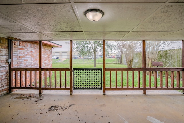 unfurnished sunroom featuring plenty of natural light