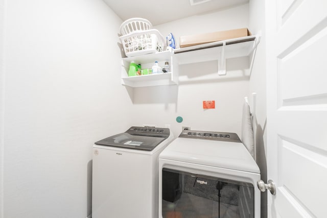 laundry room with laundry area and independent washer and dryer