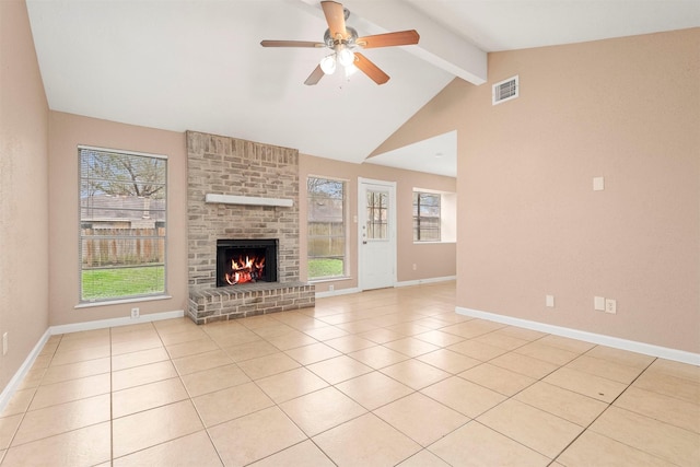 unfurnished living room with light tile patterned floors, baseboards, visible vents, lofted ceiling with beams, and a fireplace