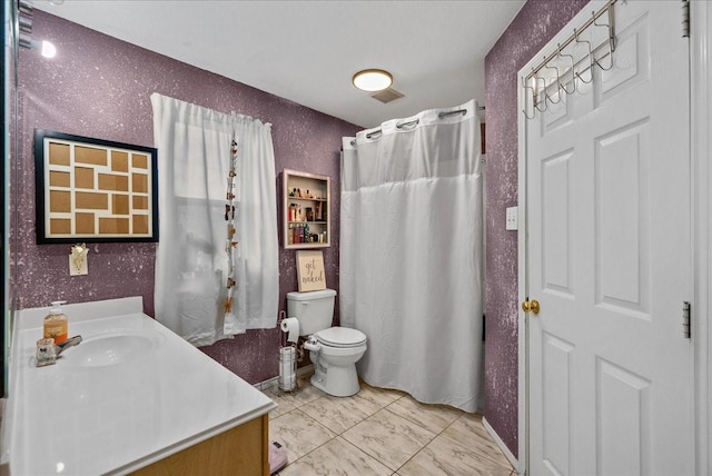 full bath featuring curtained shower, vanity, toilet, and wallpapered walls