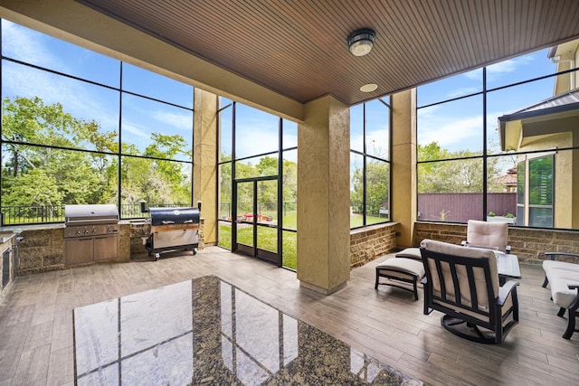 sunroom / solarium with wood ceiling