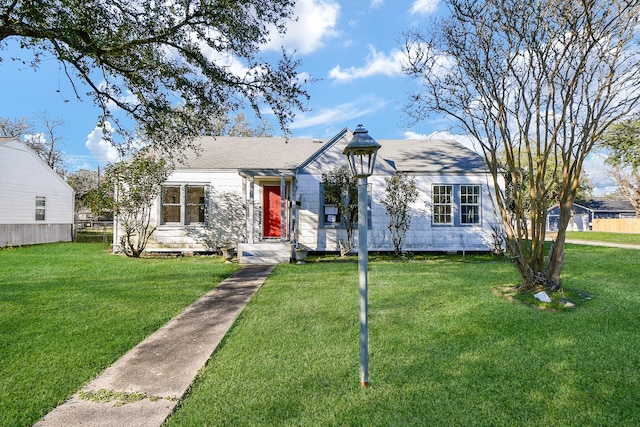 view of front of home with a front yard