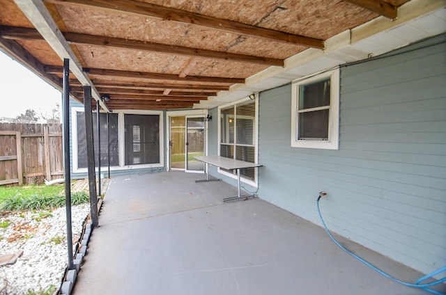 view of patio / terrace featuring fence