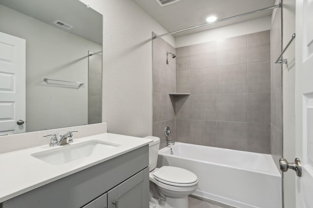 full bath with toilet, shower / bath combination, vanity, and visible vents