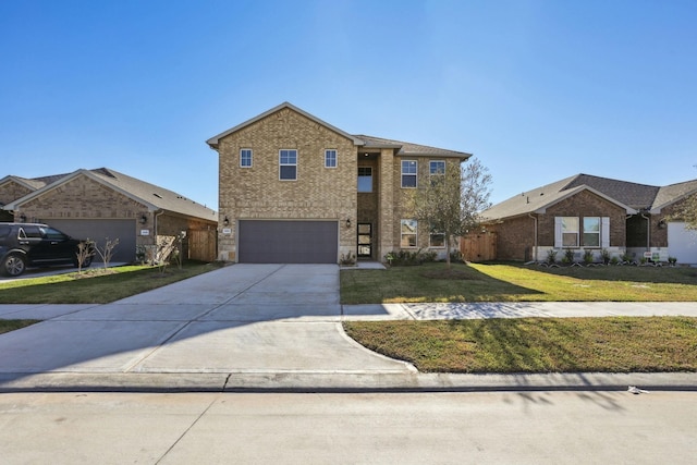 traditional home featuring an attached garage, brick siding, driveway, and a front lawn