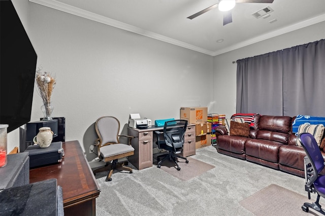 office space with light carpet, ceiling fan, visible vents, and ornamental molding