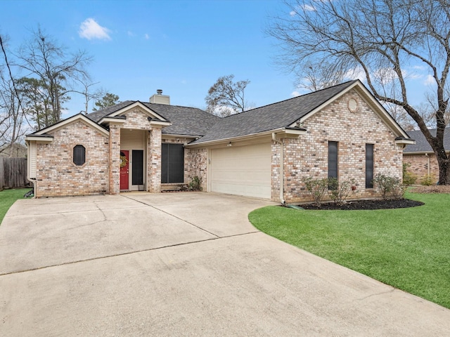 view of front of home featuring a garage, brick siding, concrete driveway, a chimney, and a front yard