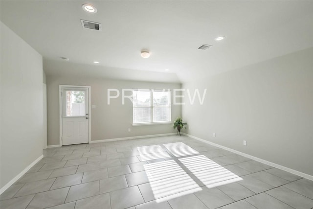 foyer entrance with light tile patterned floors, recessed lighting, visible vents, and baseboards