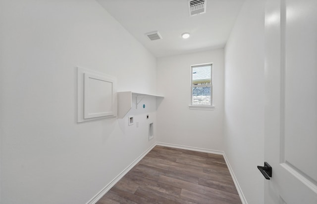 washroom with hookup for a gas dryer, laundry area, visible vents, and electric dryer hookup