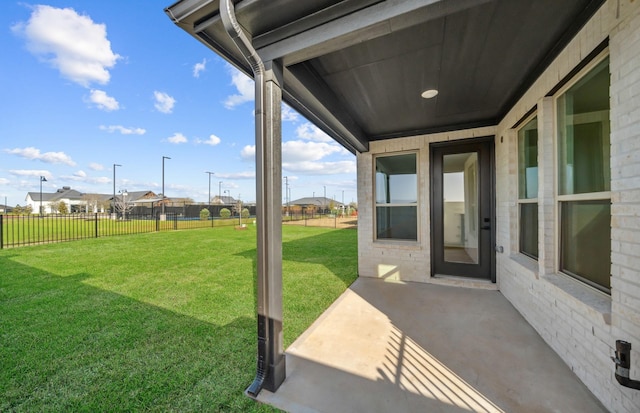 view of yard with a fenced backyard and a patio