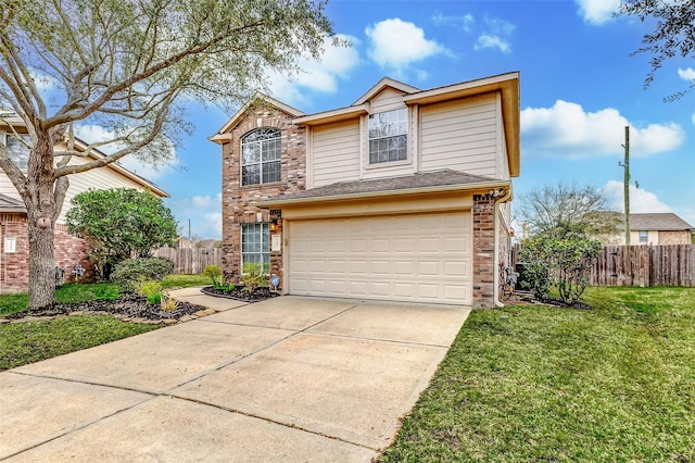 traditional-style home featuring concrete driveway, brick siding, a front lawn, and fence