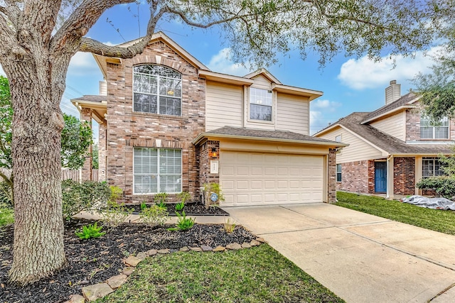 traditional-style home featuring concrete driveway, brick siding, and an attached garage