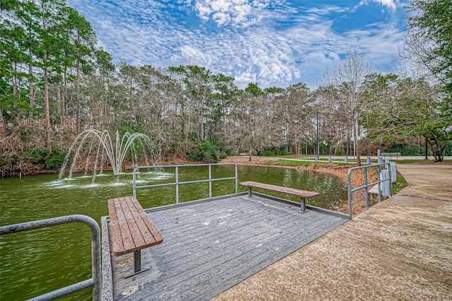 exterior space with a water view