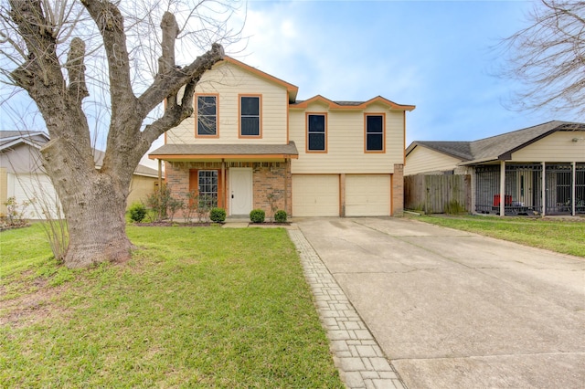 traditional-style house featuring a garage, brick siding, fence, concrete driveway, and a front yard