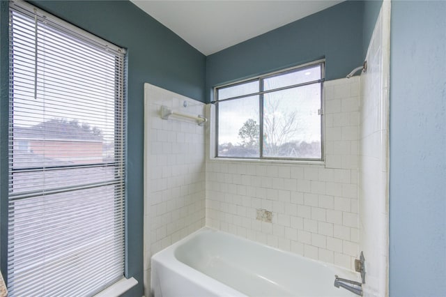 bathroom with a tub