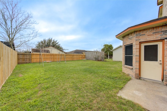 view of yard featuring a fenced backyard