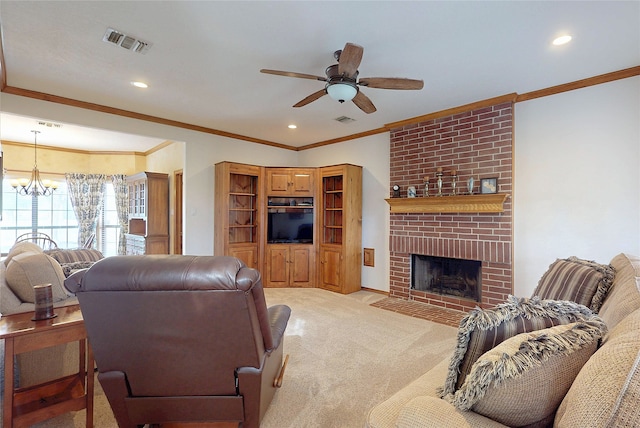 living area with visible vents, a fireplace, light carpet, and ceiling fan with notable chandelier