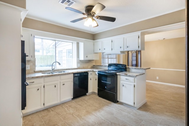 kitchen featuring black appliances, a sink, visible vents, and white cabinets