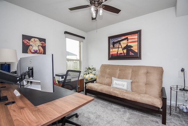 home office featuring wood finished floors and a ceiling fan