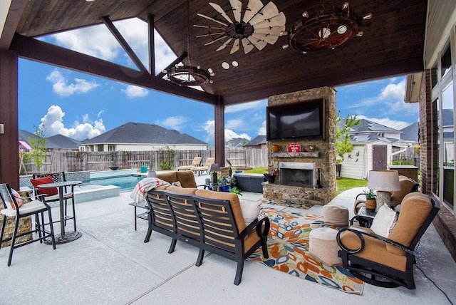 view of patio with a storage shed, a ceiling fan, a fenced in pool, a fenced backyard, and an outbuilding